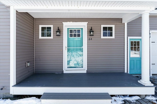 entrance to property with a porch