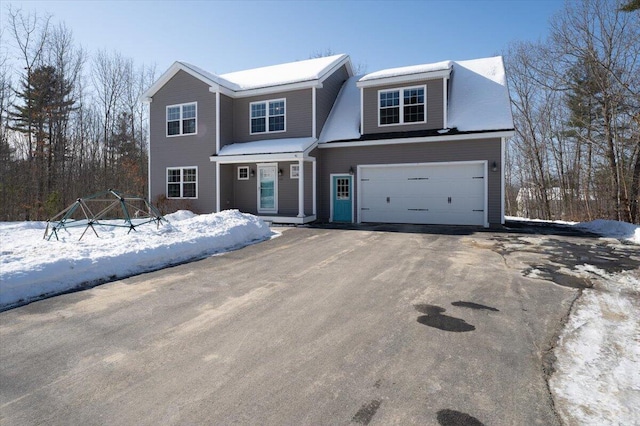 view of front facade with a garage and driveway