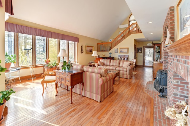 189 Mills Rd, Kennebunkport, ME 04046 - living area with recessed lighting, stairway, a fireplace, baseboards, and light wood-type flooring