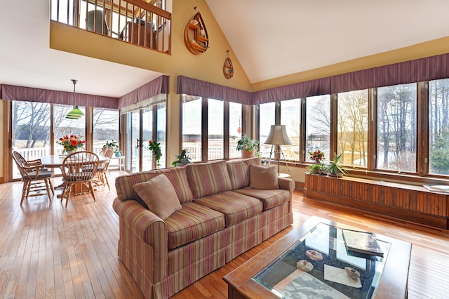 189 Mills Rd, Kennebunkport, ME 04046 - sunroom / solarium featuring hardwood / wood-style floors and high vaulted ceiling