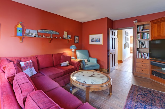 189 Mills Rd, Kennebunkport, ME 04046 - living room featuring baseboards and wood finished floors