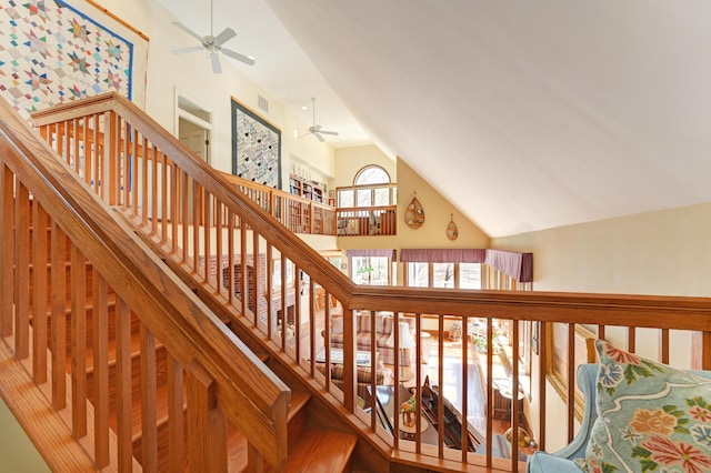 189 Mills Rd, Kennebunkport, ME 04046 - stairs featuring a ceiling fan, high vaulted ceiling, and visible vents