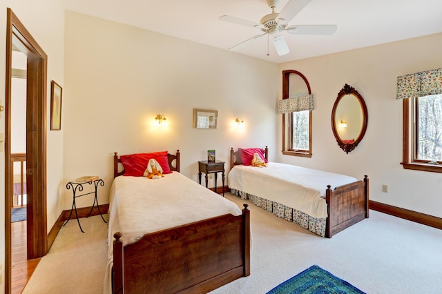 189 Mills Rd, Kennebunkport, ME 04046 - bedroom featuring multiple windows, light colored carpet, and baseboards