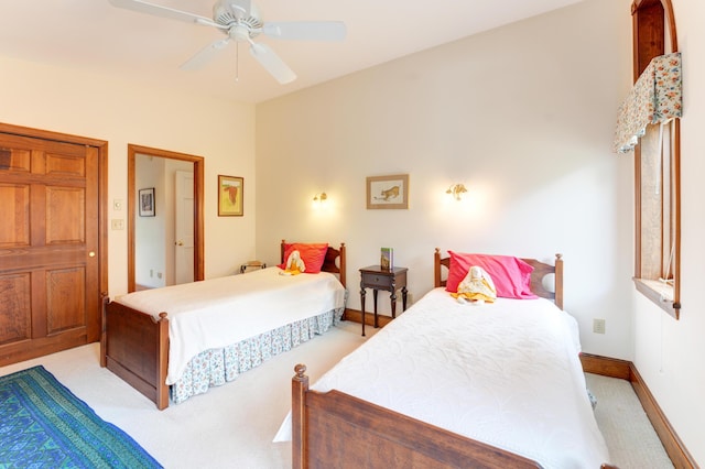 189 Mills Rd, Kennebunkport, ME 04046 - bedroom featuring light colored carpet, a ceiling fan, and baseboards
