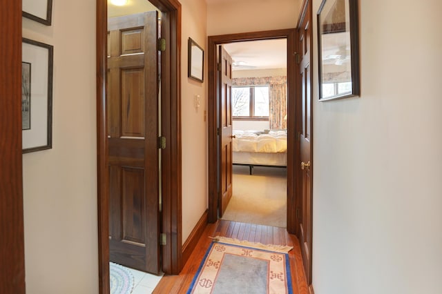 189 Mills Rd, Kennebunkport, ME 04046 - hallway with baseboards and light wood-type flooring