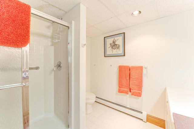 189 Mills Rd, Kennebunkport, ME 04046 - full bathroom featuring recessed lighting, a shower stall, a baseboard heating unit, toilet, and a paneled ceiling