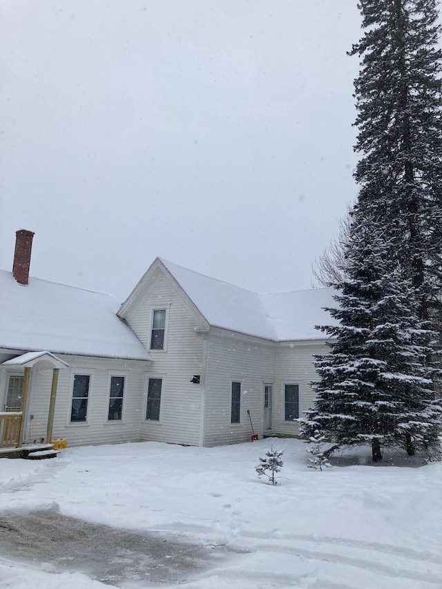 view of snow covered property