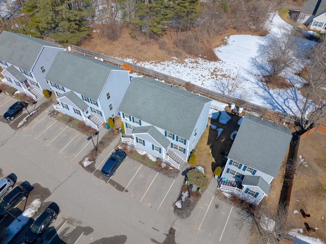 birds eye view of property with a residential view