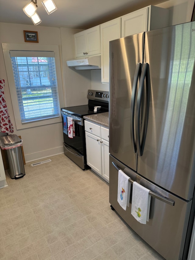 kitchen with white cabinetry, under cabinet range hood, visible vents, and appliances with stainless steel finishes