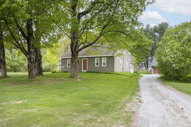598 Walnut Hill Rd, North Yarmouth, ME 04097 - view of front of property with a front yard, dirt driveway, and a garage