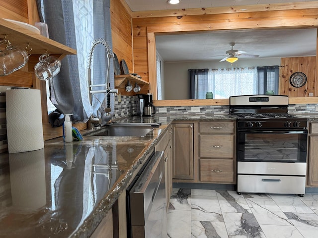 kitchen featuring backsplash, dark stone countertops, appliances with stainless steel finishes, marble finish floor, and open shelves