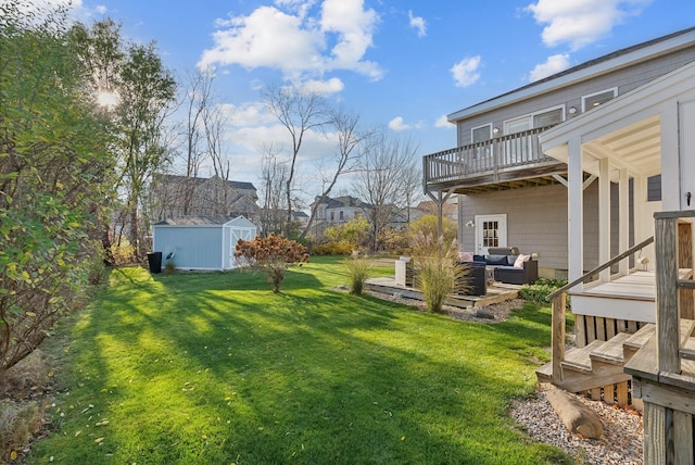 view of yard featuring a wooden deck, an outdoor hangout area, a storage shed, and an outdoor structure