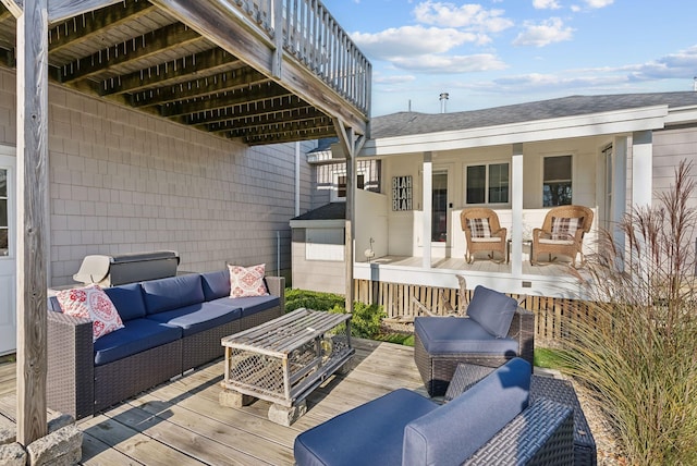 deck featuring an outdoor living space