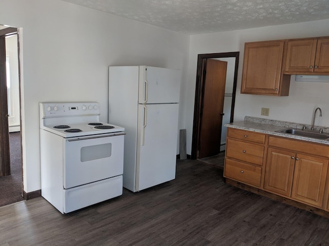 kitchen with a sink, white appliances, dark wood-type flooring, and brown cabinets