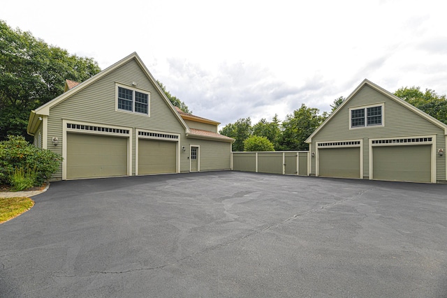 garage featuring fence