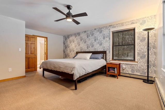 bedroom with baseboard heating, wallpapered walls, and carpet floors