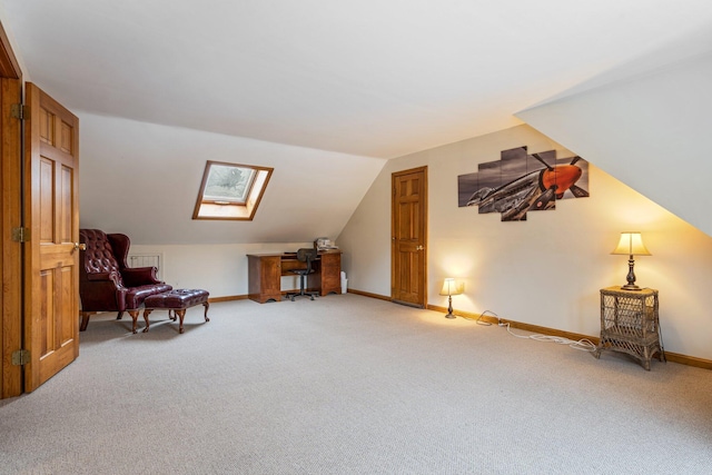 living area featuring light carpet, lofted ceiling with skylight, and baseboards