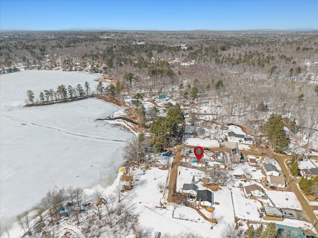 snowy aerial view featuring a residential view