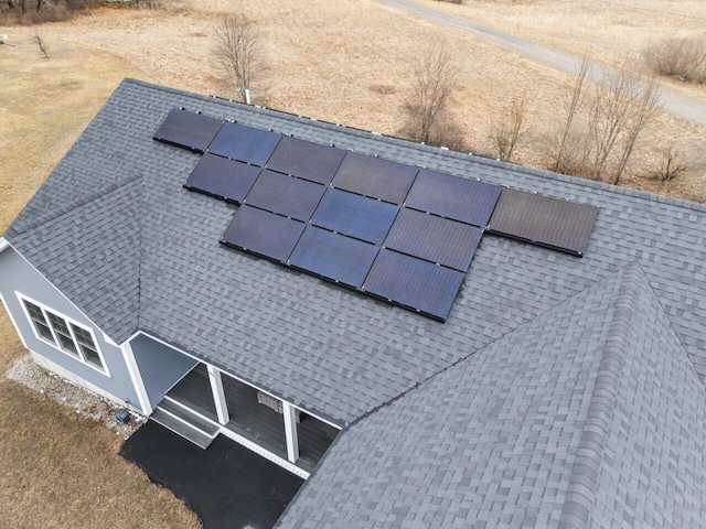 details featuring a shingled roof