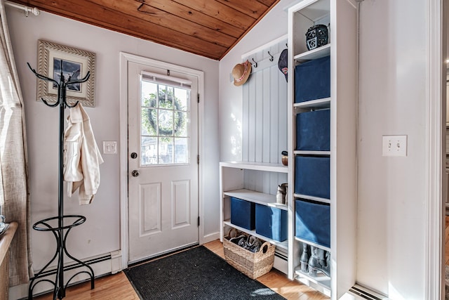 mudroom with a baseboard radiator, lofted ceiling, wood ceiling, and wood finished floors