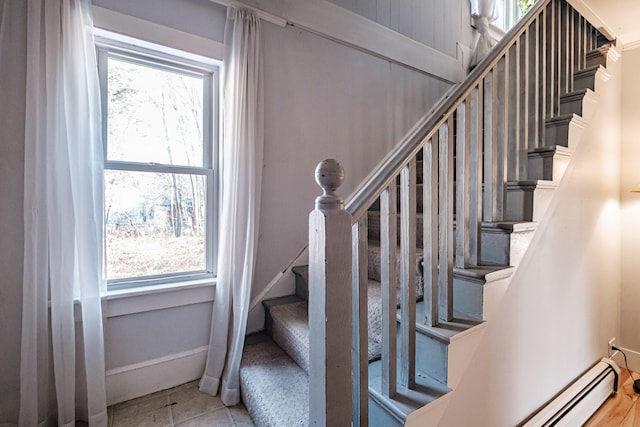 stairs with tile patterned flooring