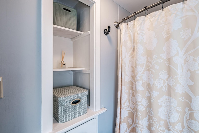 bathroom with a shower with shower curtain