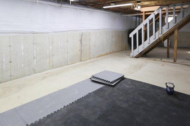 unfinished basement with stairway