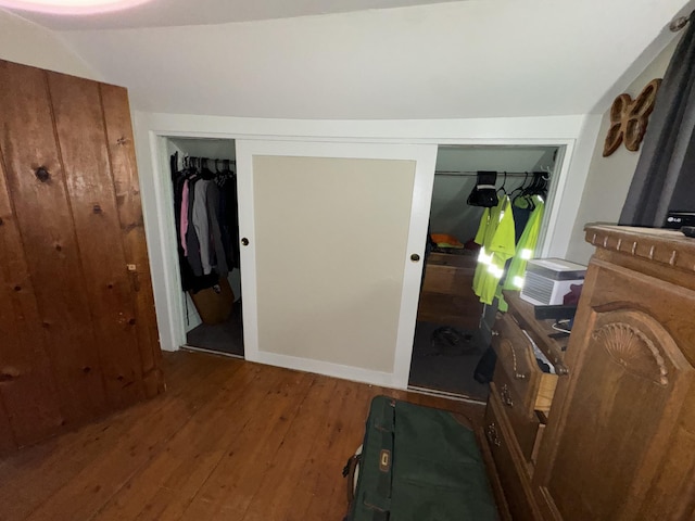 bedroom featuring a closet and wood finished floors