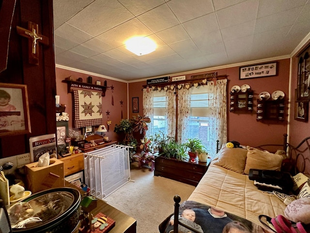 carpeted bedroom with ornamental molding