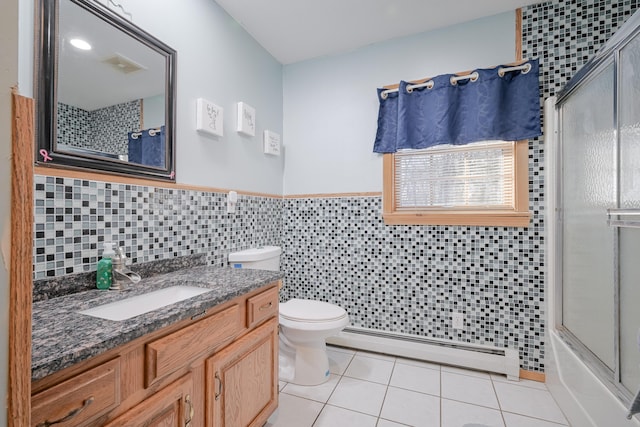 full bathroom with a shower with door, a baseboard radiator, toilet, and tile patterned flooring