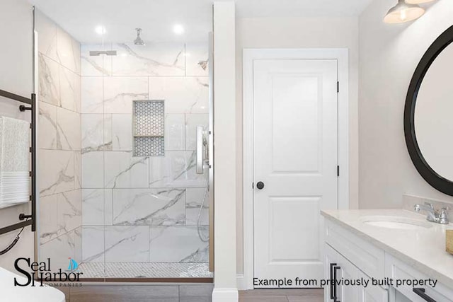11 Clam Ln Unit A, Wells, ME 04090 - bathroom with a marble finish shower and vanity