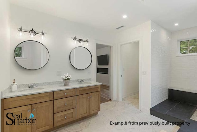 11 Clam Ln Unit A, Wells, ME 04090 - full bathroom with double vanity and recessed lighting