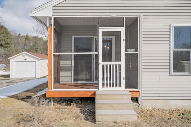 property entrance featuring a garage and covered porch