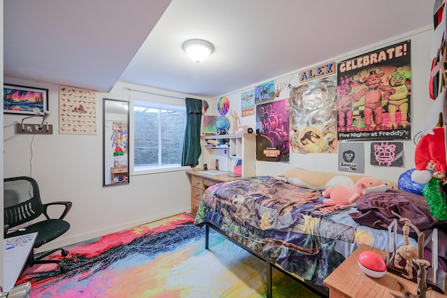 bedroom featuring baseboards