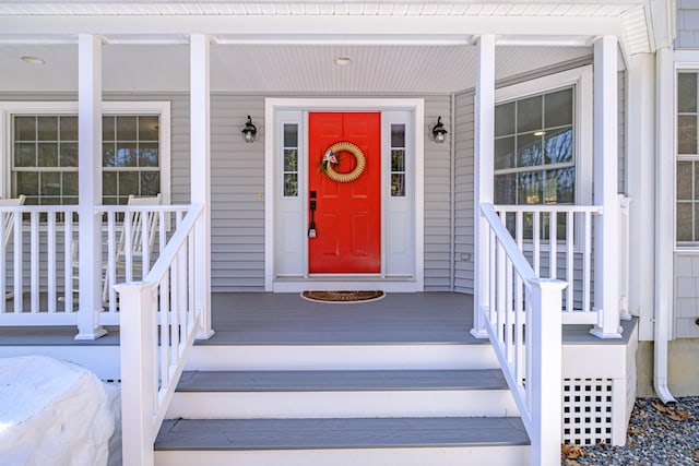 property entrance featuring covered porch