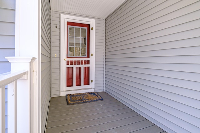 view of exterior entry featuring a garage