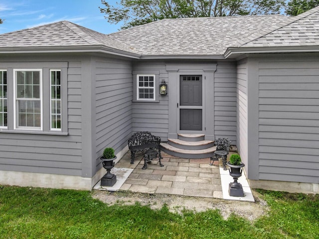 135 P Ridge Rd, Readfield, ME 04355 - entrance to property featuring a patio area and roof with shingles