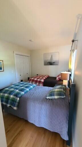 20 Wharf Rd, Blue Hill, ME 04614 - bedroom with wood finished floors and a closet