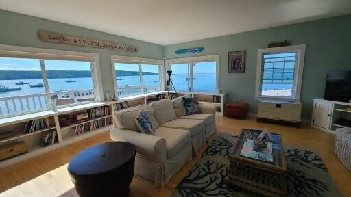 20 Wharf Rd, Blue Hill, ME 04614 - living room with a water view and wood finished floors