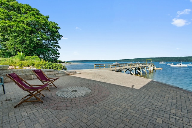 20 Wharf Rd, Blue Hill, ME 04614 - view of patio featuring a water view and a dock