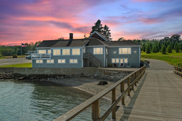 20 Wharf Rd, Blue Hill, ME 04614 - back of property featuring a water view and a chimney