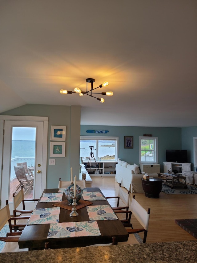 20 Wharf Rd, Blue Hill, ME 04614 - dining space with a chandelier and lofted ceiling