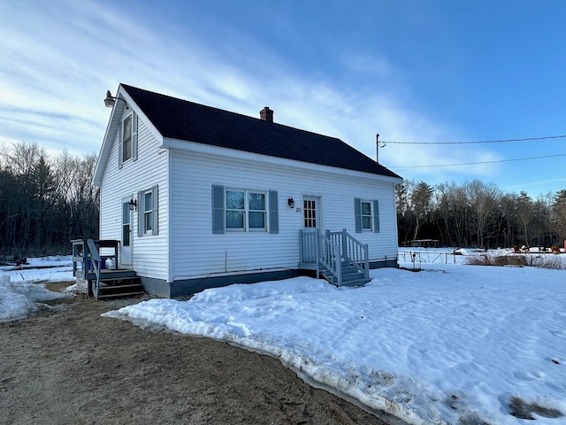 view of front of house with a chimney