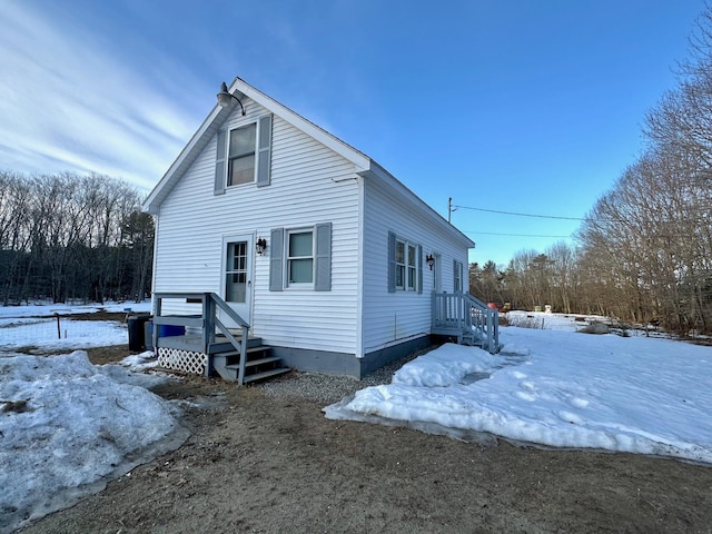 view of snow covered property