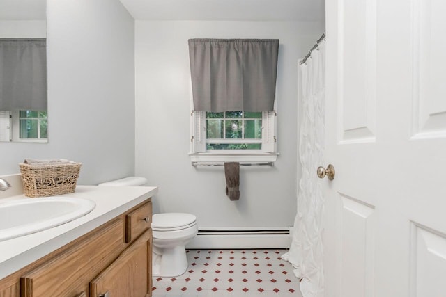 full bath featuring tile patterned floors, a baseboard radiator, toilet, and vanity