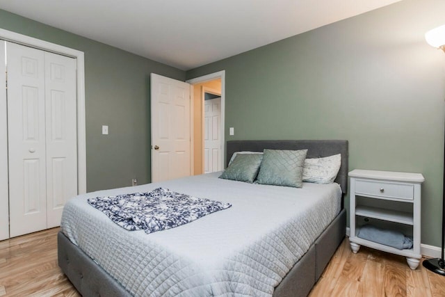 bedroom featuring a closet and wood finished floors