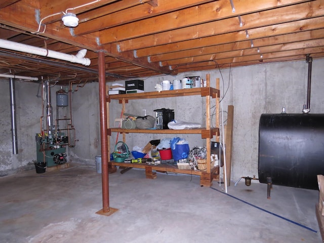 unfinished below grade area featuring heating fuel and a heating unit