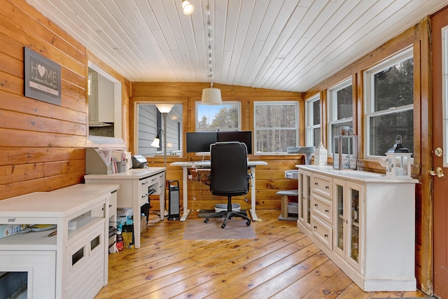 office area with vaulted ceiling, wood ceiling, wood walls, and light wood finished floors