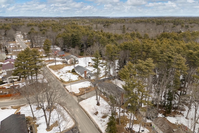 aerial view featuring a view of trees