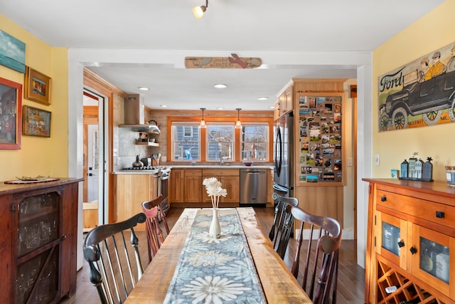 dining space with beverage cooler, recessed lighting, and dark wood-type flooring